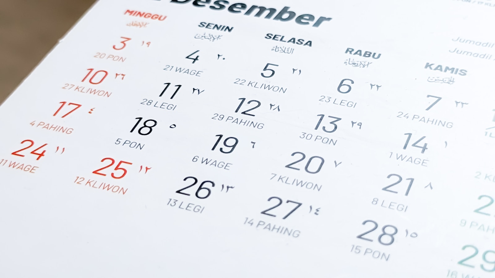 a close up of a social media calendar on a table